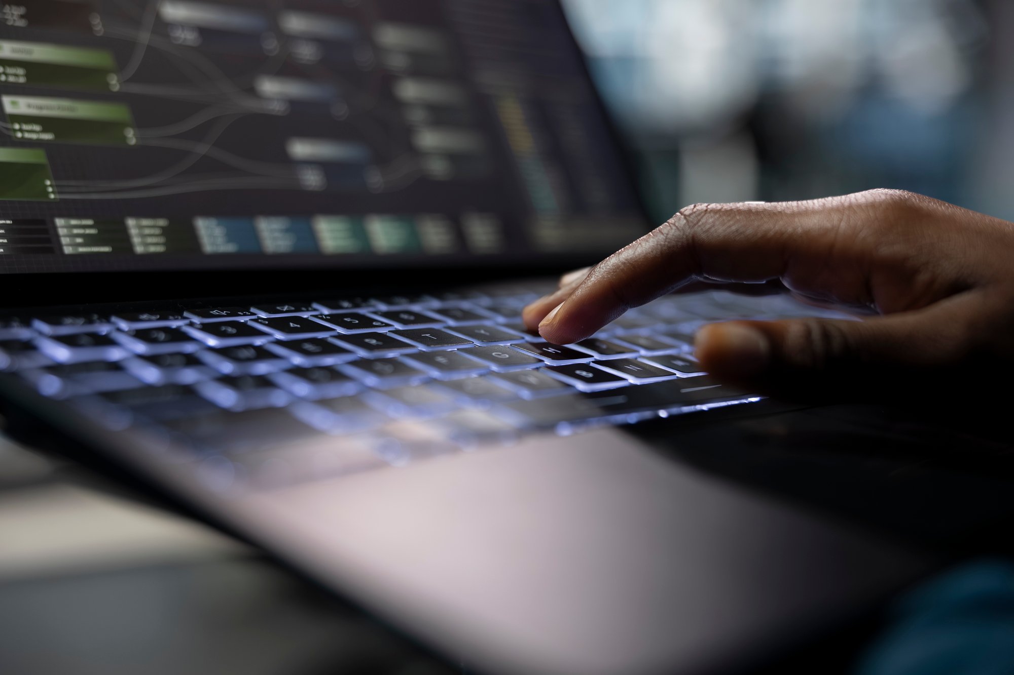 server-room-programmer-coding-laptop-typing-keyboard-close-up (1)